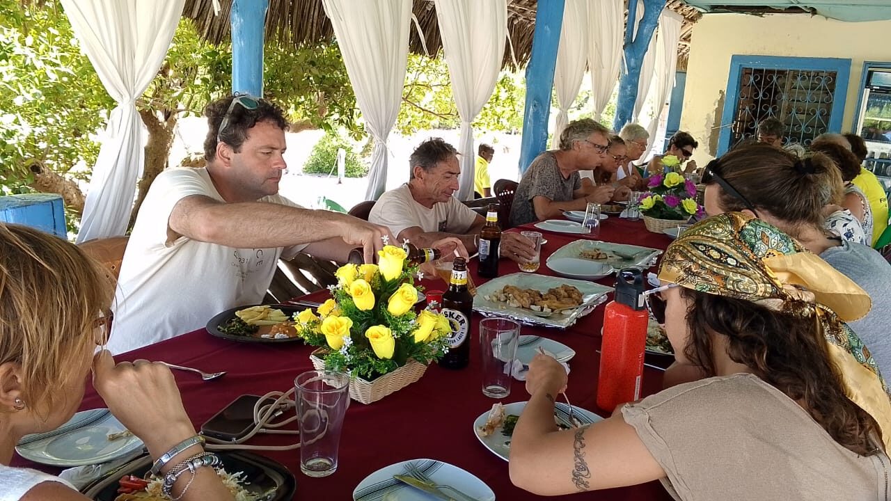 Guests dining together at Mangrove Breeze Restaurant